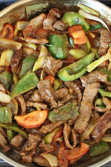 beef tomato stir fry in a pan