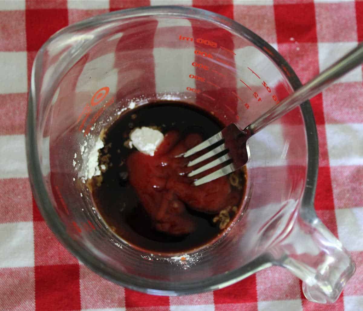 gravy ingredients in a glass measuring cup