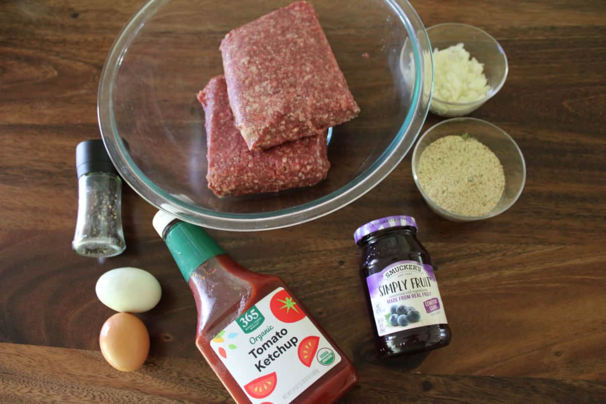 ingredients for sweet and sour meatballs on a wood counter top