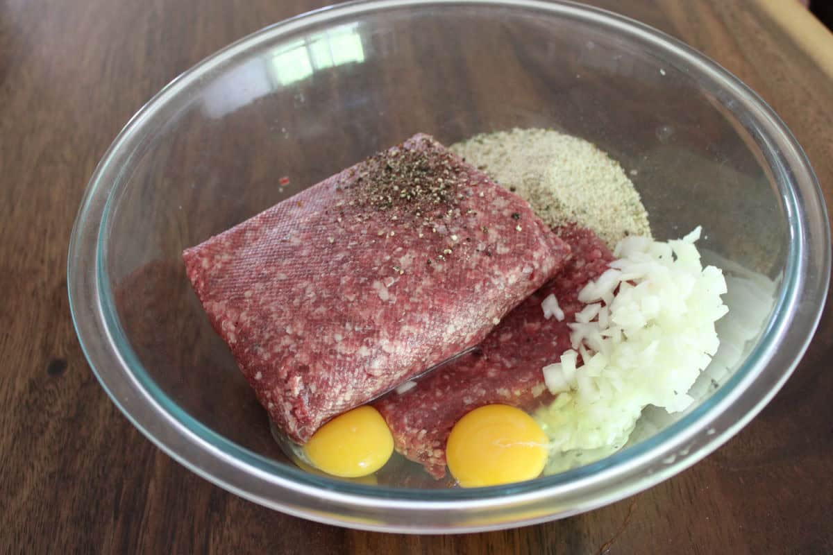 meatball ingredients in a glass bowl 