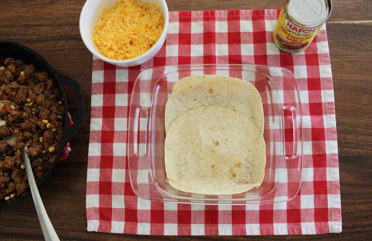 9 by 9 inch glass dish with tortillas inside