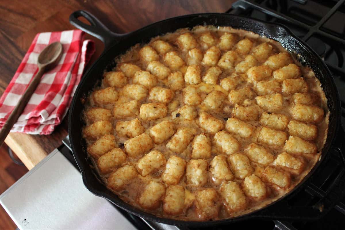 browned tater tot topping on a cowboy casserole