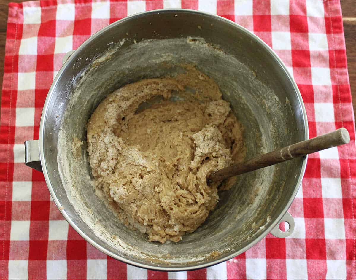 cookie dough in a silver bowl