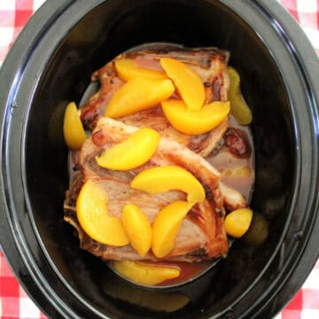 Pork chops and peaches in a slow cooker