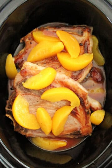 Pork chops and peaches in a slow cooker