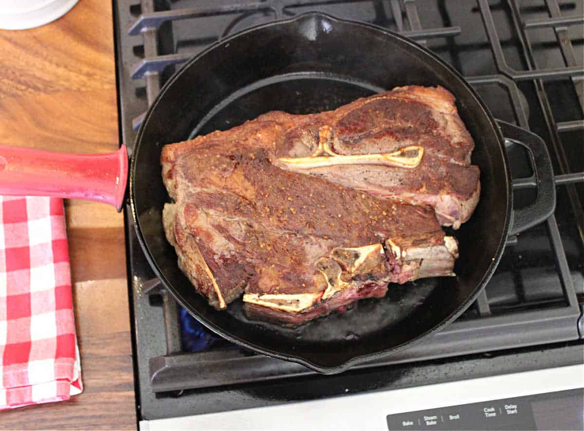 browned chuck roast in large cast iron skillet