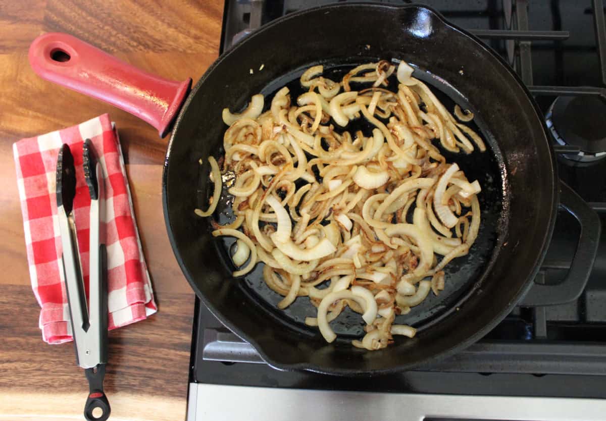 caramelized onion in black cast iron skillet